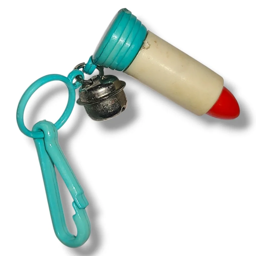 Vintage 1980s Plastic Bell Charm Clip-on Lipstick